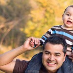 Happy Mixed Race Ethnic Family Posing for A Portrait